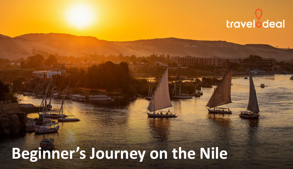 Sailboats glide on the Nile at sunset, surrounded by lush greenery and distant hills, creating a serene travel scene.